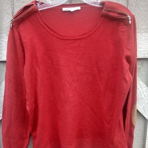 Cleo, rust colored sweater